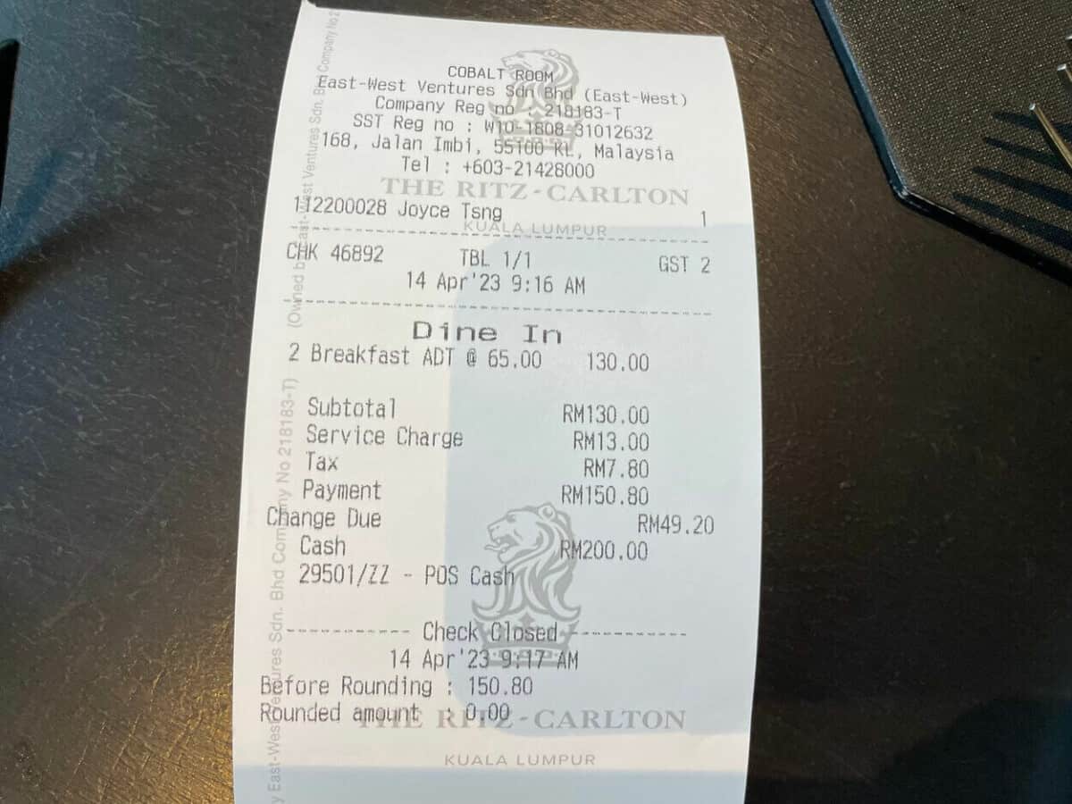 The printed bill for breakfast at the Ritz Carlton Hotel in Bukit Bintang showing a total price of 150.80rm for two people